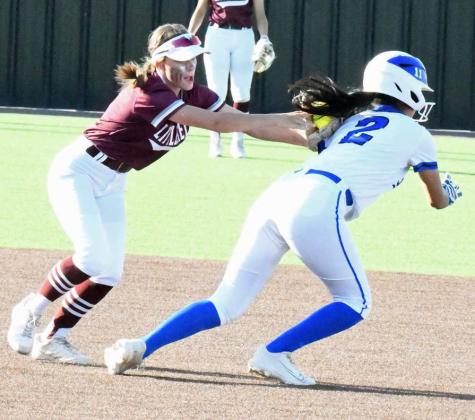 Littlefield shortstop, Bryndle Ray, fields a ground ball and tags the runner at second for an out, during the bottom of the first inning of the Lady Cats, 9-3, bi-district loss to the Lady Devils in Wink on Friday. (Staff Photo by Derek Lopez)