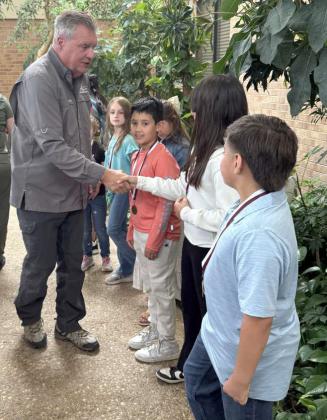 Rotary members congradulate kids from Littlefield ISD during a recent meeting, which was held at the Atrium at LHC.