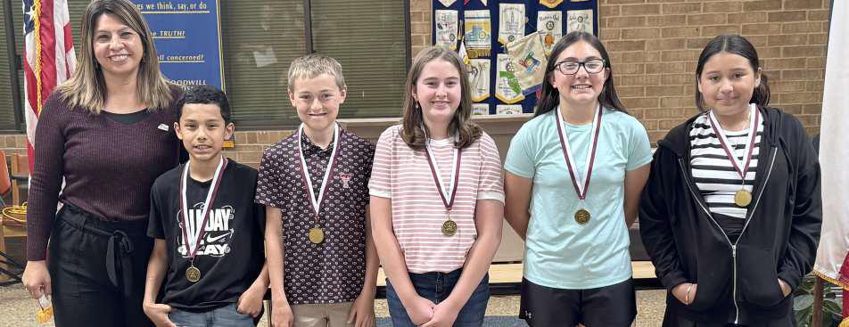 Shown is Rotary President Lori Zinn with the 5th Grade Reasoners: Jayce Cristan, Graceson Golden, Cydney Jennings, Peyton Lundberg and Eileen Garcia. (Submitted Photo)