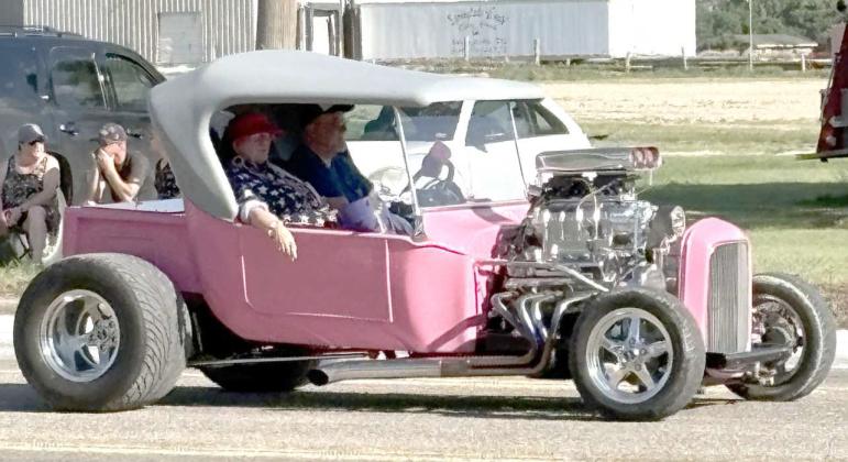 FIRST PLACE WINNER -- Krista and Stan Carpenter entered their 1923 pink stretch T-Bucket, named “Pinky-T,” in the Annual Springlake Fouth of July parade on Friday, July 4th, 2025. “Pinky-T” is the only 1923 pink stretch T-Bucket registered with the National T-Bucket Association, in that particular unique pink color, and a lot of hard work went into upgrading her with her new supercharged Chevrolet 383 CI motor. (Submitted Photo)