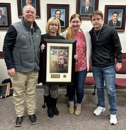 TOM LANDRYCOACHINGTHROUGH INFLUENCEAWARD – On Thursday evening, during the Littlefield ISD School Board Meeting, David Sparkman and South Plains FCA presented the Tom Landry Coaching Through Influence Award to the late Coach Jimmy Thomas. There to accept the award on his behalf were his wife, Kaylia Thomas, and their daughter Katelynn Mercer and son Jared Thomas. (Submitted Photo)