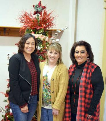 Left to right Juanita Garza-billing specialist, Kimberley Brantleybilling specialist, and Rosa Angel-Amherst City Secretary hosted the Christmas Open House held at the Amherst City Hall on Wednesday, December 14, 2022. (Photo by Ann Reagan)
