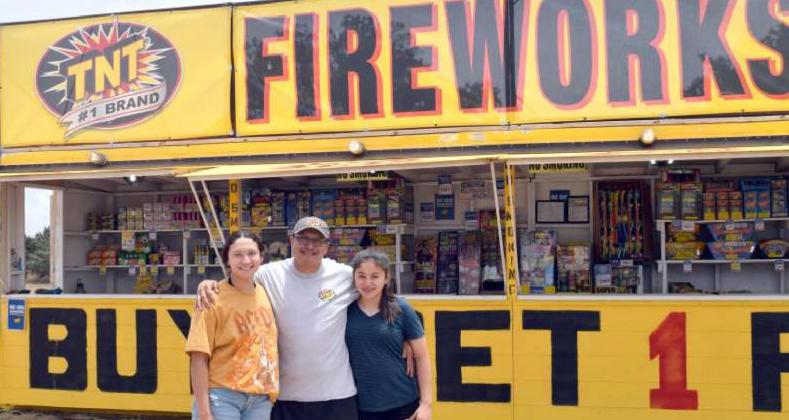 TNT FIREWORKS -- Leilani Solis, Armando Solis, and Serena Solis, operators, for company is located on HWY 385 south from Littlefield. (Photo by Ann Reagan)