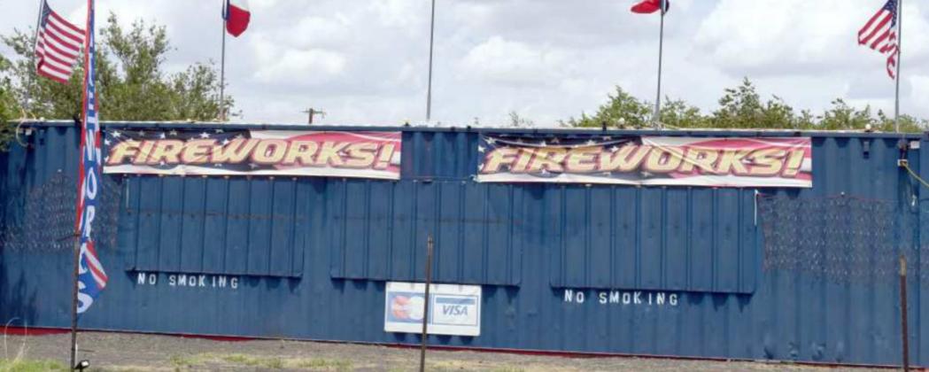 RANDY’S FIREWORKS -- Rebekka Roberson, owner, and Chris Harper, firework stand is located on HWY 385 north from Littlefield. Open after 5:30 p.m. on weekdays. Open at noon on weekends. (Photo by Ann Reagan)
