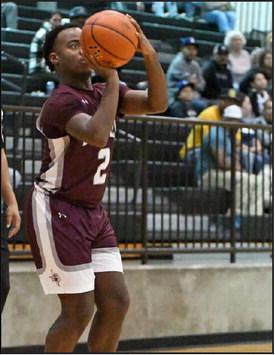Littlefield senior, Eizeah Coleman, fires up a three from the right elbow, during the first half of the Wildcats’ trouncing of Muleshoe on Friday on the road. (Staff Photo by Derek Lopez)