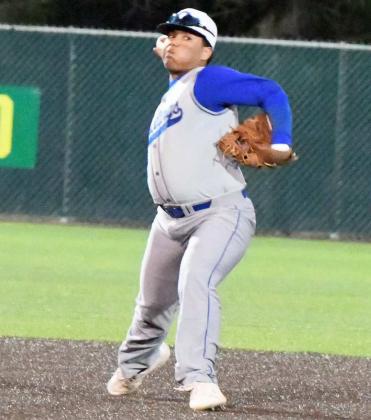 Olton shortstop, Fabian Gutierrez, fields a ground ball and throws it to first for an out, during the top of the first inning of the Mustangs’ loss to Nazareth in Littlefield on Tuesday. (Staff Photo by Derek Lopez)
