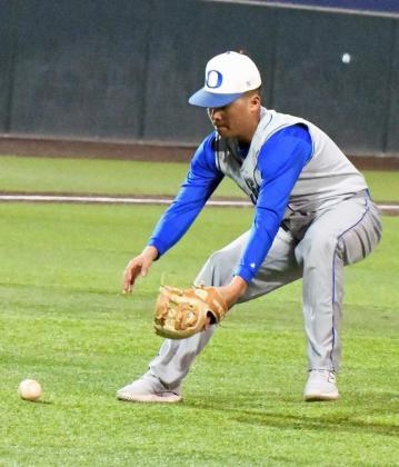 Olton pitcher, Paytn Jimenez, fields a slow roller on the first-base side and throws it to first for an out, during the top of the first inning of the Mustangs’ loss to Nazareth in Littlefield on Tuesday. (Staff Photo by Derek Lopez)