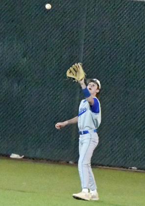 Olton center fielder, Jett Tomsu, catches a fly ball for an out, during the top of the second inning of the Mustangs’ loss to Nazareth in Littlefield on Tuesday. (Staff Photo by Derek Lopez)