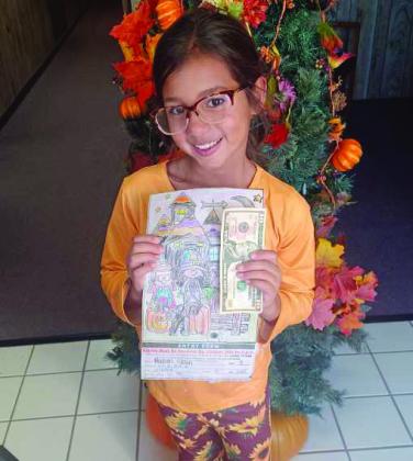 Madison Spain won third place in the Lamb County Leader-News Halloween Coloring Contest 8-10 year old division. (Staff Photo by Grata Reber)