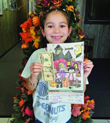 Mia Torres won third place in the Lamb County Leader-News Halloween Coloring Contest 5-7 year old division. (Staff Photo by Derek Lopez)