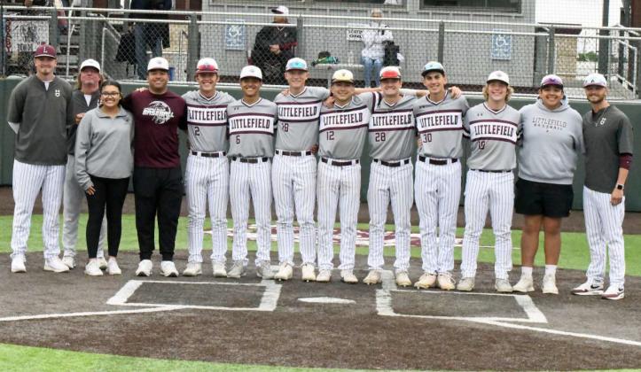 The Littlefield Wildcats’ varsity baseball team celebrated senior day on Saturday, after falling to the Shallowater Mustangs, 2-0, in their regular season finale at Wildcat Field. (Shown L-R): Head Coach Jett Hartley, Asst. Coach Ryan Menasco, trainer, Kali Cornette, Marcquis Rosemond,Major McNeese, Gabriel Villanueva, Bradyn Redman, Ian Mendez, Chip Green, Adam MacDonald, Jakob Kirkland, Sean Ybarra and Asst. Coach Blake Green. (Staff Photo by Derek Lopez)