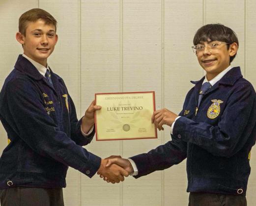 FFA Vice President Ty Carr presents Luke Trevino with a Greenhand FFA Degree at the annual FFA banquet on May 12, 2025. (Staff Photo by Madison Vidales)