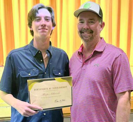 Lamb County SWCD Vice-Chairman Jeff Edwards awards Sudan High School’s 2026 second-place senior scholarship winner, Kooper Edwards, with a certificate and a $600 scholarship.(Submitted Photo)