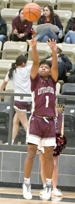 Littlefield senior MJ Randle (1), fires up a three from the left wing, during the second half of the Wildcats, 74-36, road victory on Tuesday against the Golden Tornadoes. (Staff Photo by Derek Lopez)