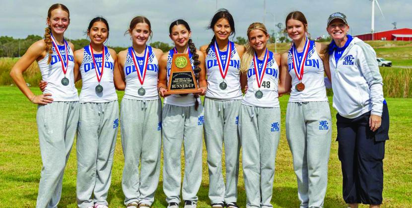 The Olton Fillies’ varsity cross country team competed at Mae Simmons Park in Lubbock on Tuesday at the District 3-2A Meet where they finished as the District Runner-Up, qualifying the team for Regionals. (Shown): Amie Beelitz, Xavyree Arredondo, Ella Azam, Gabriella Reyes, Mariana Gallegos, Harlow Gorman, Jentry Bressler and Coach Ruth Beelitz. (Photo Courtesy of Dusty Gorman)