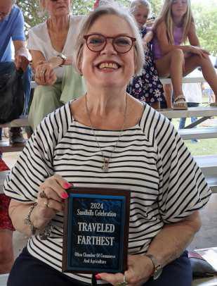 Sherilyn McGill Pharr won the “Traveled Furthest” Award, coming all the way from Boston, Mass.