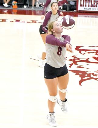 KEEPING THE BALL IN PLAY - Littlefield’s Taryn Golden bumps the ball back into the court to give the Lady Cats a chance at an attack, during the first set of their match against Lamesa last Thursday at the Littlefield Tournament. (Staff Photo by Derek Lopez)