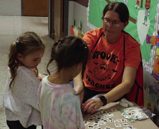Tatoos! (temporary) at the Littlefield Primary Fall Festival on Monday October 27, 2025. (Photo by Ann Reagan)