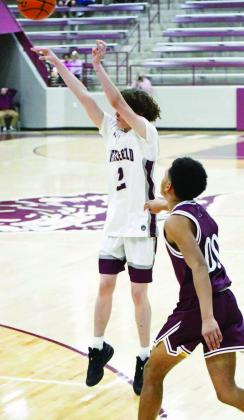 Littlefield’s Andrew Davis fires up a three, during the second half of the Wildcats’, 71-40, loss to the Abernathy Antelopes last Monday at Wildcat Gym. (Staff Photo by Derek Lopez)