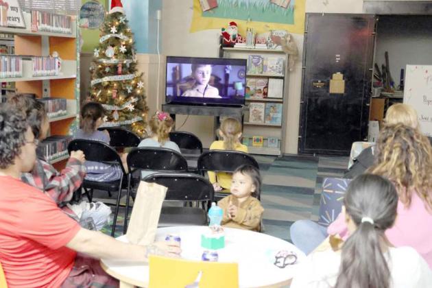 Guests of the Lamb County Library enjoyed a presentation of 'The Polar Express' along with free popcorn during the family free movie night on Thursday, December 21, 2023. (Photo by Ann Reagan)