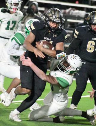 RUNNING THROUGH THE DEFENSE – Sudan senior running back, Josue Cervera, runs through a would-be Eagles tackler, during the Hornet’s Bi-district victory over Ropes at Slaton on Friday night. (Staff Photo by Derek Lopez)