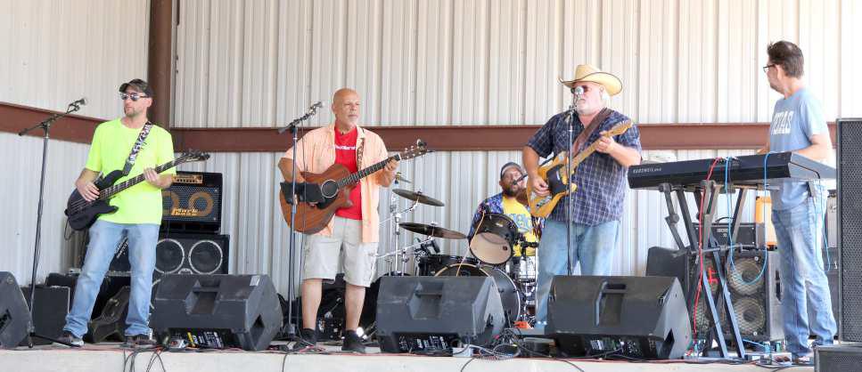Daylateandadollarshort entertains the crowd at the Jamaica Day Celebration at the Sacred Heart Catholic Church of Littlefield on Sunday, August 25, 2024. Five bands performed during the celebration. (Photo by Ann Reagan)