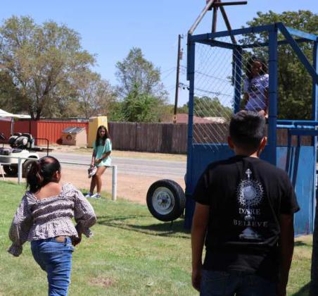 This young lady is ready to try her luck at the dunking booth at the Jamaica Day Celebration held at the Sacred Heart Catholic Church of Littlefield on Sunday, August 25, 2024. (Photo by Ann Reagan)