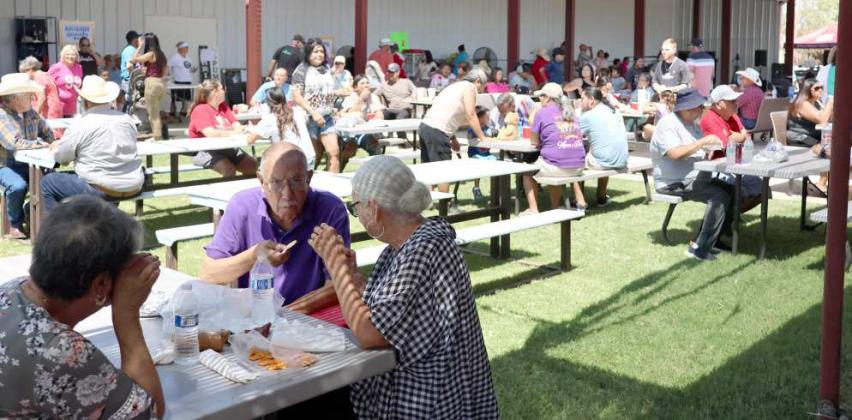 People attending the Jamaica event at the Sacred Heart Catholic Church of Littlefield enjoy great food and live music on Sunday, August, 25, 2024. (Photo by Ann Reagan)