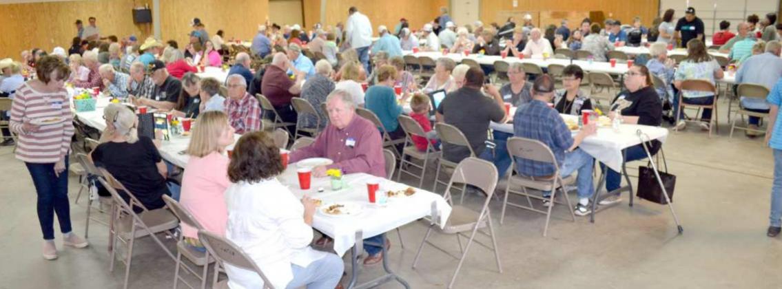 PART OF 231 GUESTS AT BOB EDWARDS’ PARTY – Bob Edwards was expecting 200 guests to attend his 13th annual Fish Fry Saturday evening, April 24, 2021 in the Ag and Community Center. The guests were enjoying a good time of fellowship with their friends, as they enjoyed the fish, chicken, french fries, cole slaw, and potato salad. Many had the chance to visit with Bob Edwards. (Staff Photo by Joella Lovvorn)