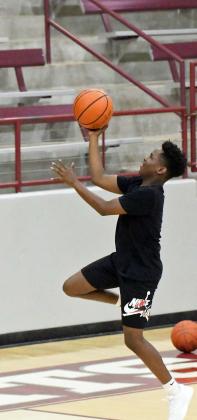 Future Wildcat basketball players work on their lay-ups, during the afternoon session of the 2024 Wildcat Youth Basketball Camp on Monday. (Staff Photos by Derek Lopez)