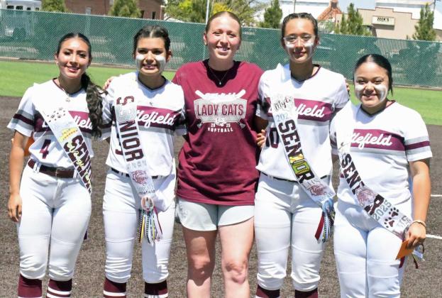 The Littlefield Lady Cat’s varsity softball team celebrated senior day with an, 18-3, victory over the Roosevelt Lady Eagles at Lady Cat Field on Saturday. Shown are the four seniors with Head Coach Ally Oyanguren. (L-R): Alyssa Torres, Cali Saldana, Coach O, Myli Hernandez and Natalia Sanchez. (Staff Photo by Derek Lopez)