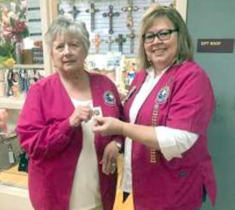 NEW MEMBER HOSPITAL AUXILIARY – Linda Lucas, left, was installed as a new member of the LHC Hospital Auxiliary at it’s meeting Thursday, May 13, 2021. Presenting the hour bar pin, was Auxiliary President Lori Durham, right. (LHC Auxiliary Photo)