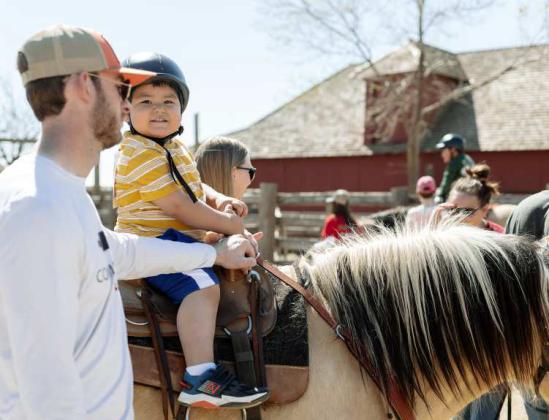 The Texas Tech University Therapeutic Riding Center will offer horseback rides to children from 10 a.m. to 1p.m. during 54th Annual Ranch Day on April 22. (Photo by Adrian Hawkins)