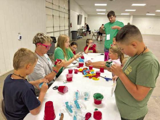 Campers at the 4-H Project Camp are shown creating marshmallow shooters when learning about shooting sports, during day one of Project Camp on Monday at the Lamb County Ag Center. (Submitted Photo)