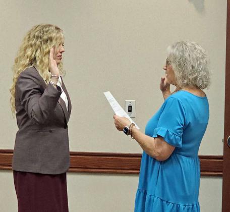 Shawna Wagley Hastings was sworn in by Jackie Milligan on Monday, during the lunch school board meeting, as an At-large member of the Littlefield ISD School Board. (Staff Photo by Derek Lopez)