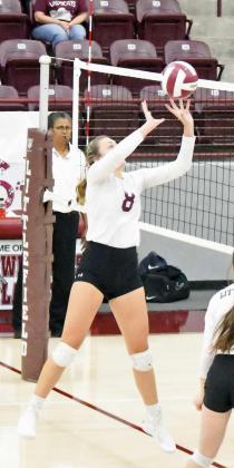 OVER THE BLOCK – Littlefield junior, Madison McNeese, sends a tip over the Denver City blocker, during their, 3-1, victory over the Fillies on Saturday at Wildcat Gym. (Photo by Marisa Lopez)