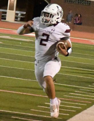 TIPTOEING DOWN THE SIDELINE – Littlefield senior tailback, Mason Jones, breaks free around the right side and sprints down the sideline for a huge gain in the second half of the Wildcats’, 33-14, victory over Denver City on the road on Friday night. (Staff Photo by Derek Lopez)