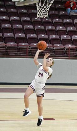 FAST BREAK - Littlefield junior, Kennadi Hanlin, drops in a lay-up on the fast-break off of a steal, during the first half of the Lady Cats, 47-42, victory over Hereford on Tuesday at Wildcat Gymnasium. (Staff Photo by Derek Lopez)
