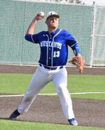 THROWINGACROSS FOR THE OUT - Olton third baseman, Paul Lopez, fields a grounder at third and fires it across the diamond to first for an out, during the bottom of the first inning of the Mustang’s seeding game against New Deal on Monday in Littlefield. (Staff Photo by Derek Lopez)
