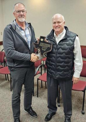 Littlefield ISD Board Member, Lance Broadhurst, retired from the LISD Board of Trustees, at the December Board meeting on Wednesday, after 29 years of service to LISD. He was presented with a plaque by Superintendent Mike Read for his years of serivce. (Staff Photo by Derek Lopez)