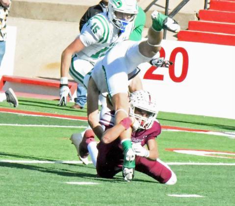 Littlefield junior linebacker, Ben Castillo (8), makes a tackle for loss on Wall’s ball carrier, during the second quarter of the Wildcat’s 3A Regional Play-off game in Sweetwater on Friday. (Staff Photo by Derek Lopez)