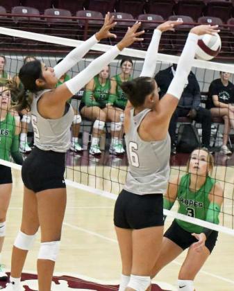 Littlefield’s Kealee Bussey deliveres a block for a kill, during the Lady Cats’ first set against Ropes in the Littlefield Tournament last Thursday. (Staff Photo by Derek Lopez)