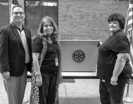 Dezi Vargas poses alongside newly-selected President-Elect and Club Secretary Rachel Moreno and Lupe Rodriguez at the Rotary Club of Littlefield meeting on April 2, 2026. (Photo by Madison Vidales)
