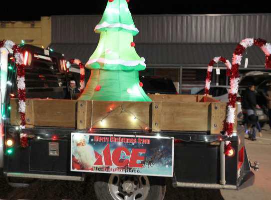 The Ace Hardware float boasts a Christmas Tree and Candy Canes in the Lighted Christmas Parade on Friday, Dec. 15th. (Photo by Ann Reagan)