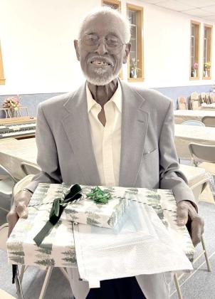John D. McCarty holds gifts after celebrating the second annual John D. McCarty Day on Jan. 14, 2025. (Photo provided by Sharon Johnson)