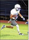 Olton receiver, Manny Carrasco, catches a pass and blazes across the middle for a monster gain, during their Midnight Madness scrimmage Friday night. (Staff Photo by Derek Lopez)
