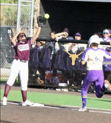 STRETCHING FOR THE OUT – Littlefield first baseman, Cadence Sanchez, stretches up to catch a high throw for an out, during the Lady Cats’, 14-2, walk-off victory over the Alpine Lady Bucks on Thursday at Big Spring in the 3A Bi-district round of the play-offs. (Staff Photo by Derek Lopez)
