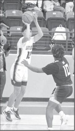 Littlefield senior, Nate Castaneda, fires up a three from the right wing, during the first half of the Wildcats’ district victory over Muleshoe Tuesday night at Wildcat Gym. (Staff Photo by Derek Lopez)