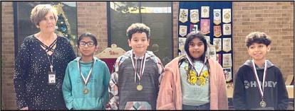 ROTARY REASONERS - Fifth Graders, Christopher Coronado ( Ingle), Analyna Hinojosa (Lowe), Diego Silviera (Rangel), Yazmin Valasquez Gutierrez (Steadman). The awards were awarded during the Thursday, Dec. 8th Rotary Meeting at the Lamb Healthcare Center Atrium. (Submitted Photo)