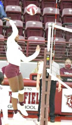 GOING FOR THE KILL – Littlefield’s Shamicha Wilson goes up to deliver a kill, during the second set of the Lady Cats’ win over Dimmitt on Tuesday in straight sets. (Staff Photo by Derek Lopez)